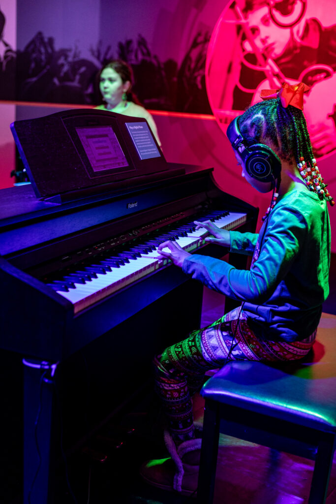 Child playing the piano.