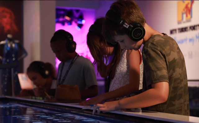 Mississippi Grammy Museum Kids playing with sound display.