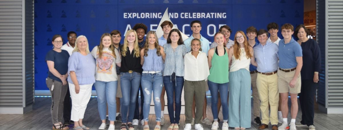 a group of people posing for a photo