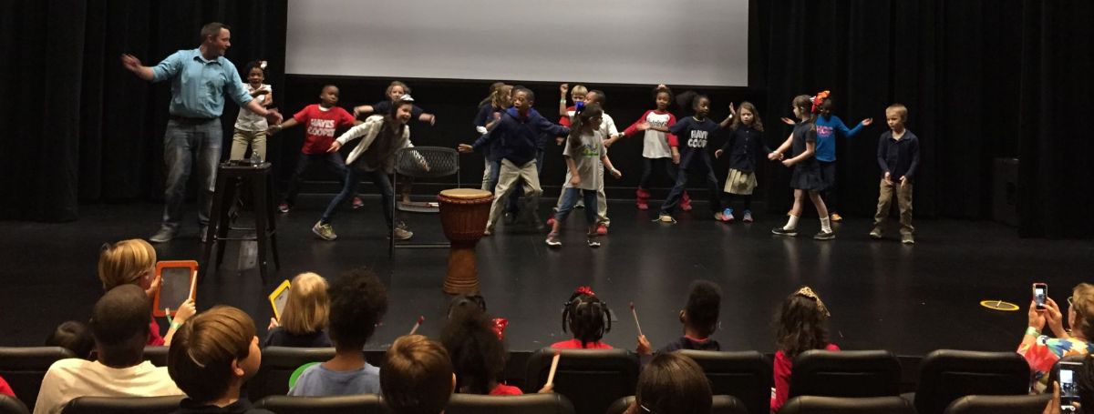 a group of children on a stage